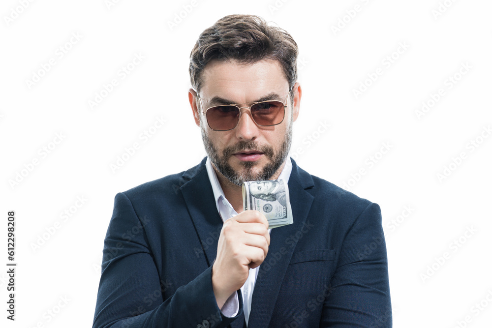 Man with money cash. Dollar banknotes. Portrait of businessman holding money banknotes. Dollar bills, credit, online banking. Rich man pointing at dollar banknotes, bank loan, financial savings. Man with money cash. Dollar banknotes. Portrait of businessman holding money banknotes. Dollar bills, credit, online banking. Rich man pointing at dollar banknotes, bank loan, financial savings.
