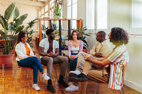 Fotografija Five diverse young people on group therapy session