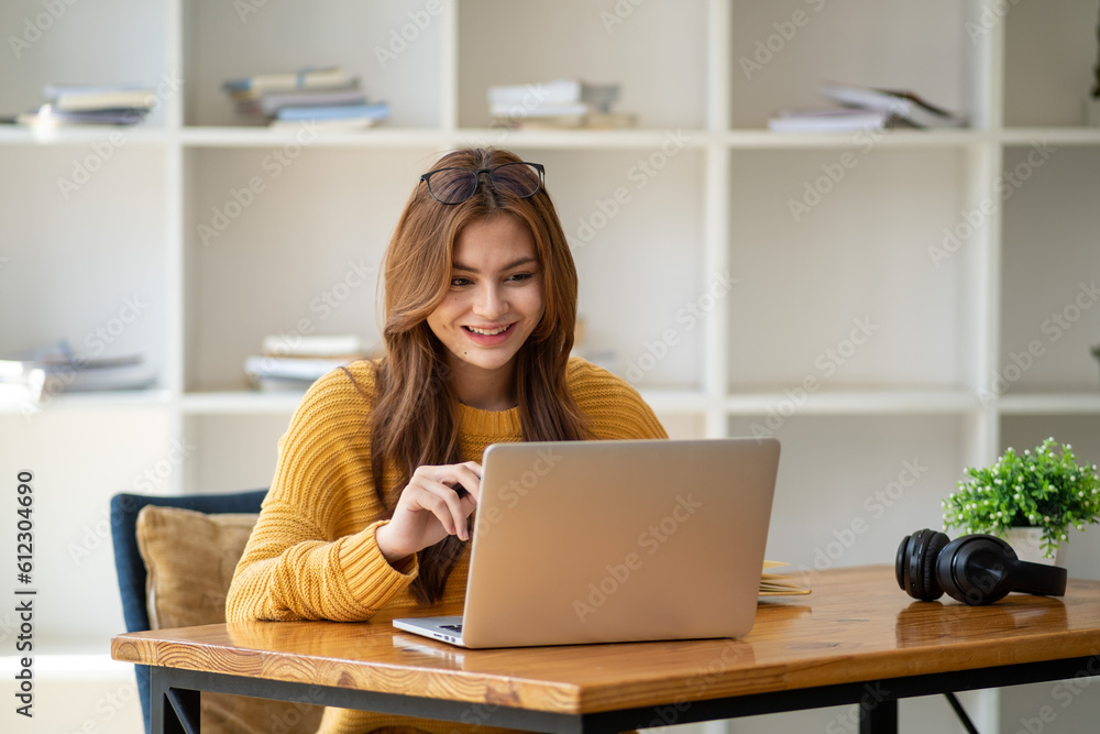 Distance Education. E-learning, Study online, Smiling beautiful woman sitting at desk and wearing headphone head set study online class zoom google meet discord, Happy engaged girl attending for learn Distance Education. E-learning, Study online, Smiling beautiful woman sitting at desk and wearing headphone head set study online class zoom google meet discord, Happy engaged girl attending for learn