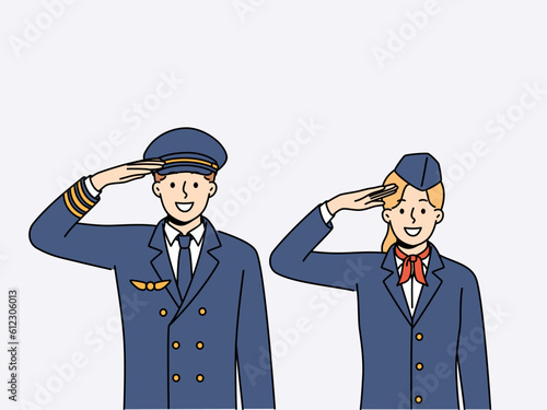 Pilot of aircraft and stewardess greet passengers of flight and thank you for using services of airline. Crew of aircraft from pilot with stewardess in service uniform smiling looking at screen