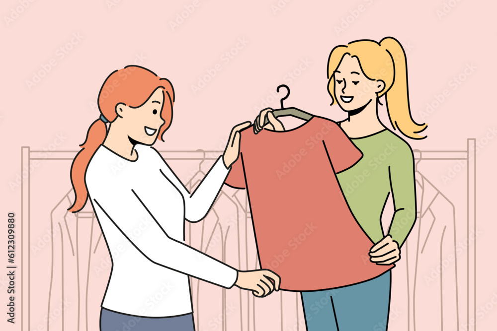 Smiling consultant help client with clothes choose in store. Woman buy apparel in boutique. Fashion and consumerism. Vector illustration. Smiling consultant help client with clothes choose in store. Woman buy apparel in boutique. Fashion and consumerism. Vector illustration.