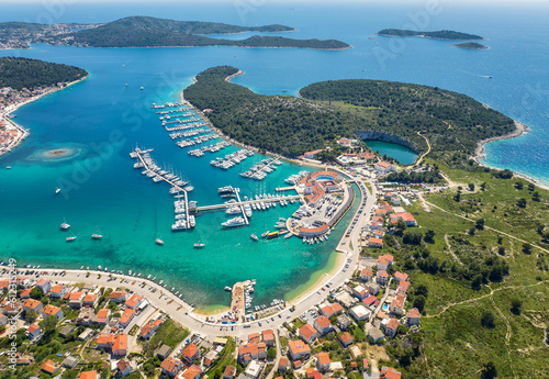 Aerial panoramic view of Rogoznica turquoise bay town and marina, central Dalmatia region of Croatia