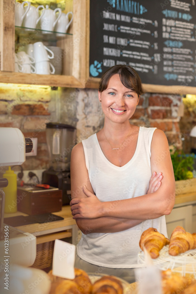 Portrait smiling cafe owner