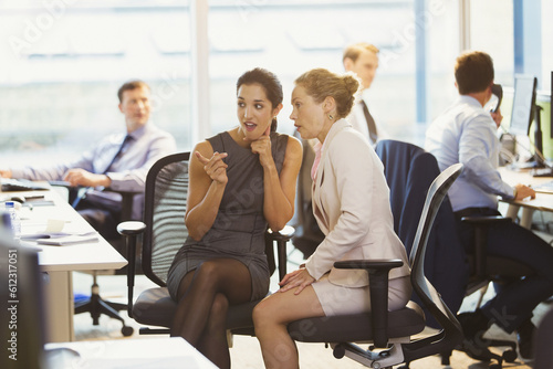 Φωτογραφία Businesswomen gossiping in office