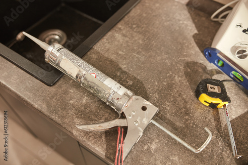 Wallpaper Mural Silicone for fixing kitchen sink in the apartment. Torontodigital.ca