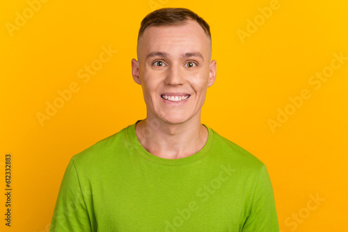 Young casual man portrait isolated on yellow color background © Tetiana