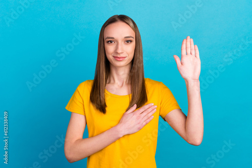 Принти на полотні Photo portrait of serious girl listening anthem patriot swearing isolated on blu