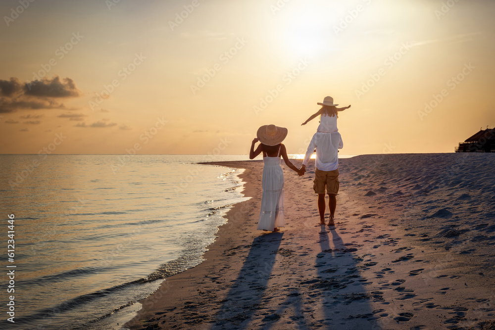 custom made wallpaper toronto digitalA elegant family in white clothing walks hand in hand down a tropical paradise beach during sunset tme and enjoys their summer vacatios