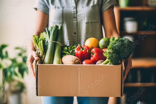 Billede på lærred Fresh and Organic Vegetables Delivered to Your Doorstep: Woman's Exciting Delive