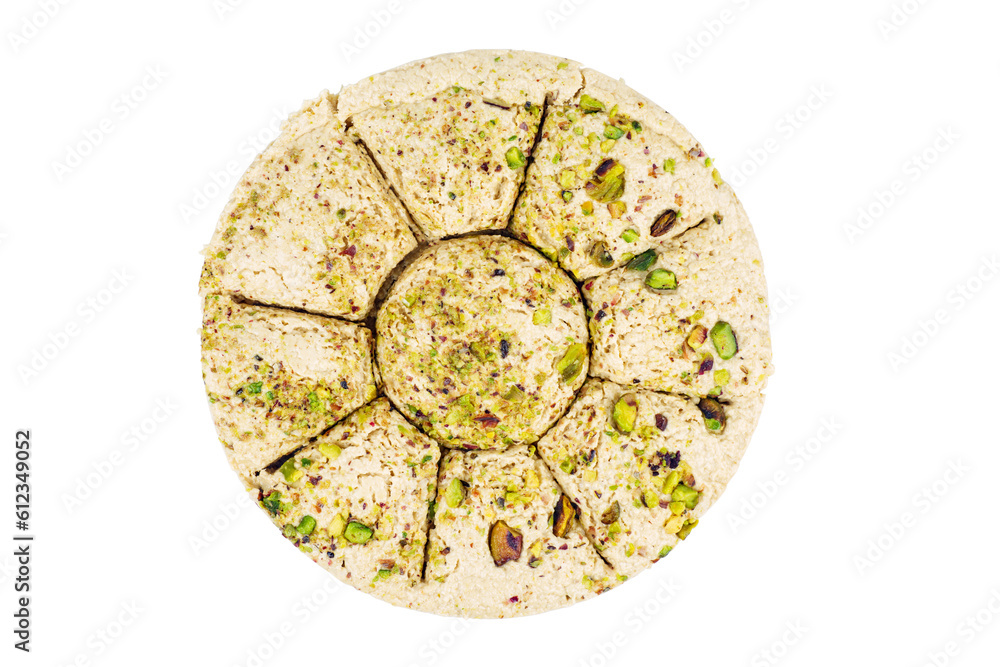 Sesame halva with pistachios isolated on a white background Sesame halva with pistachios isolated on a white background
