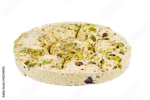 Sesame halva with pistachios isolated on a white background