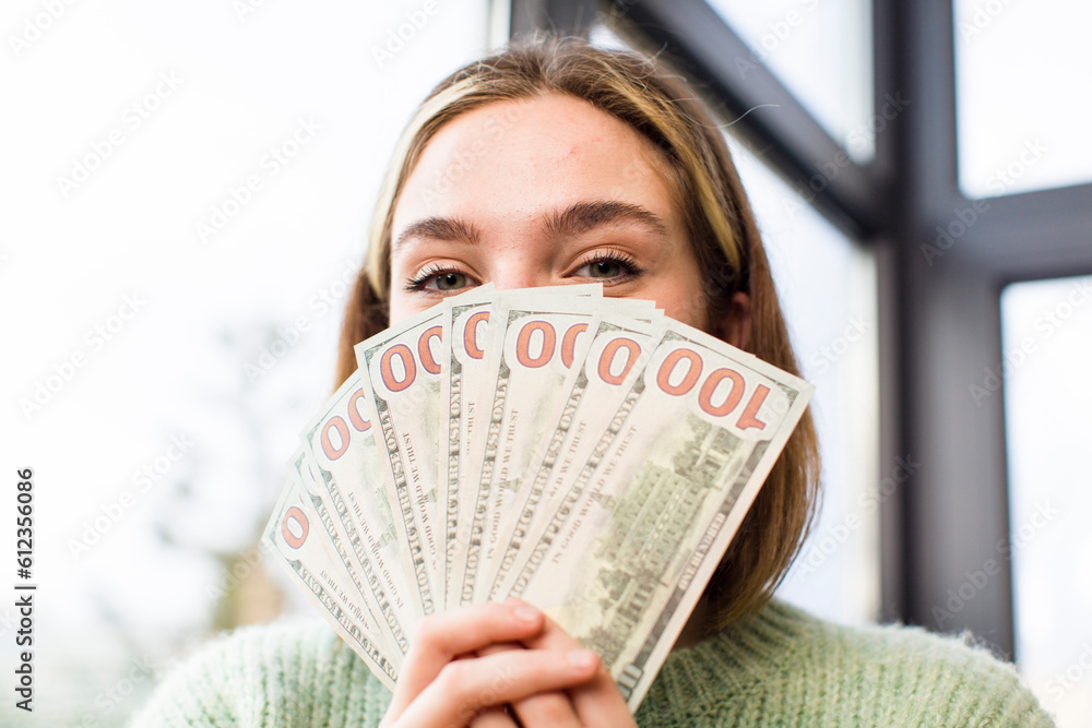 pretty young woman with bills. house interior design pretty young woman with bills. house interior design