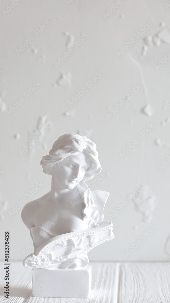 Marble head of young woman, ancient Greek goddess bust isolated on white background with space for text. Marble head of young woman, ancient Greek goddess bust isolated on white background with space for text.