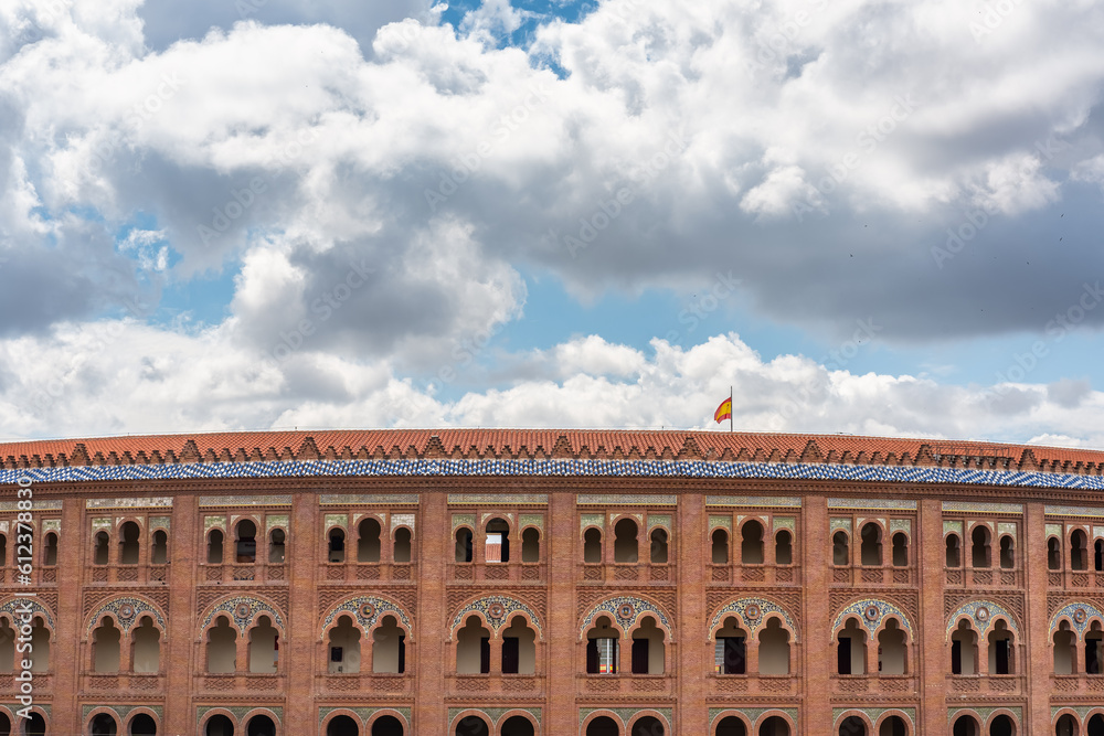 Huge bullring of Las Ventas with sky of storm clouds, photo with copyspace.