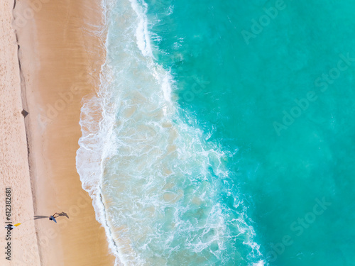 Sea surface aerial view,Bird eye view photo of crashing waves sandy shore,Sea water surface texture,sea background,Beautiful nature seascape,Amazing top view beach background