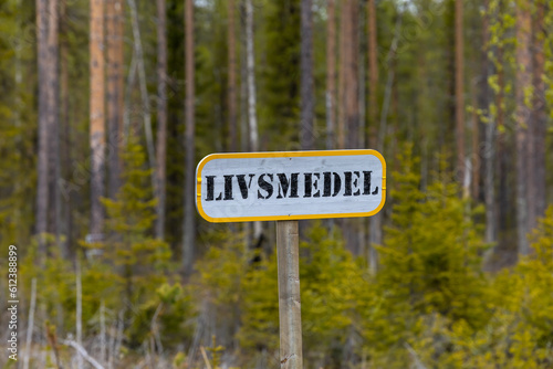 Boliden, Sweden A homemade sign on a country road says Livsmedel in Swedish, which means groceries. photo