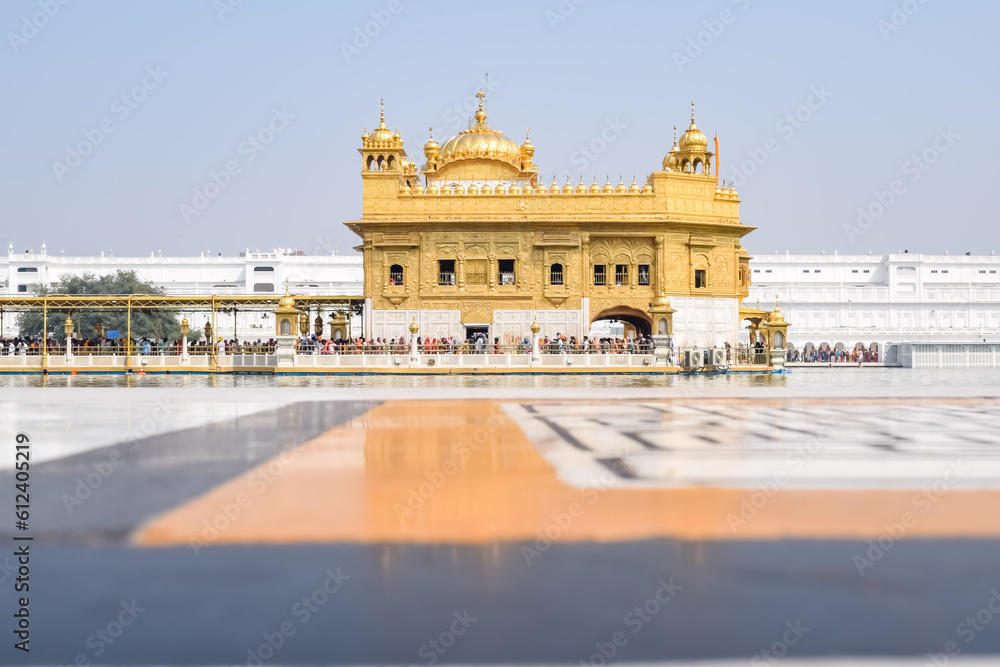 Fototapeta premium Beautiful view of Golden Temple (Harmandir Sahib) in Amritsar, Punjab, India, Famous indian sikh landmark, Golden Temple, the main sanctuary of Sikhs in Amritsar, India
