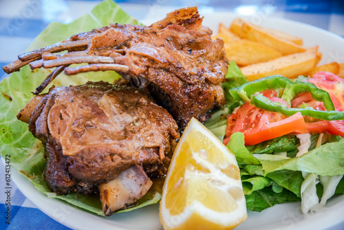Oven baked lamb ribs, traditional Greece Cuisine recipe.
