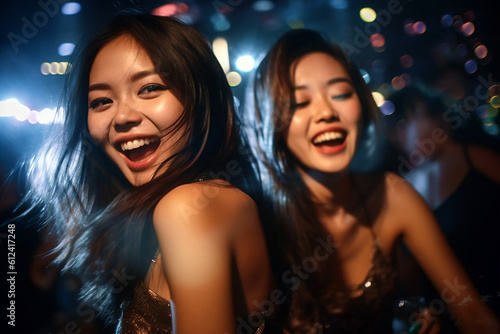 two asian women dancing in nightclub and having fun. generative ai