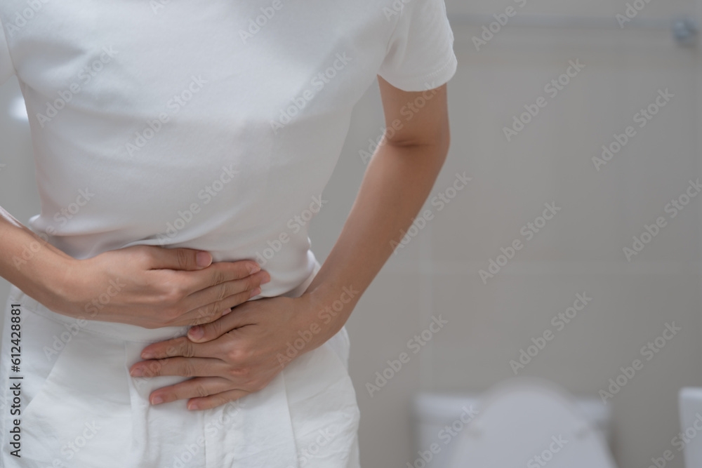 Constipation and diarrhea in bathroom. Hurt man touch belly stomach