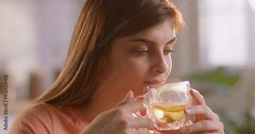 Millennial woman smell, drink tasty aroma fresh brew green tea and enjoy. Millennial woman smell, drink tasty aroma fresh brew green tea and enjoy.