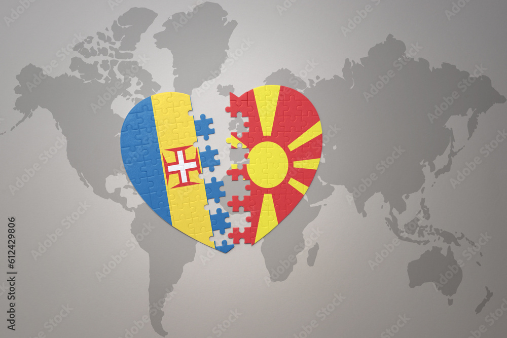 puzzle heart with the national flag of macedonia and madeira on a world ...