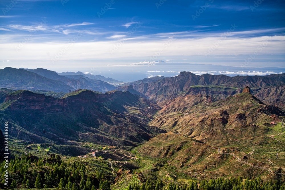 Fototapeta premium Roque Nublo under a cloudy sky on a sunny day, Gran Canary, Spain