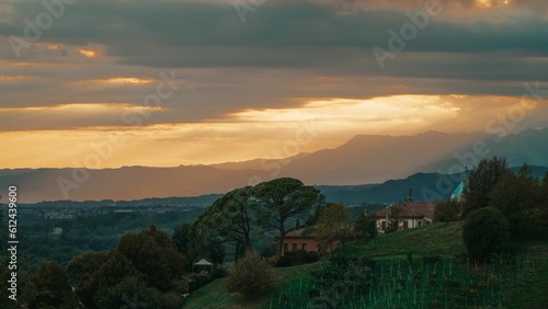 Beautiful view of a small town surrounded by nature at sunset