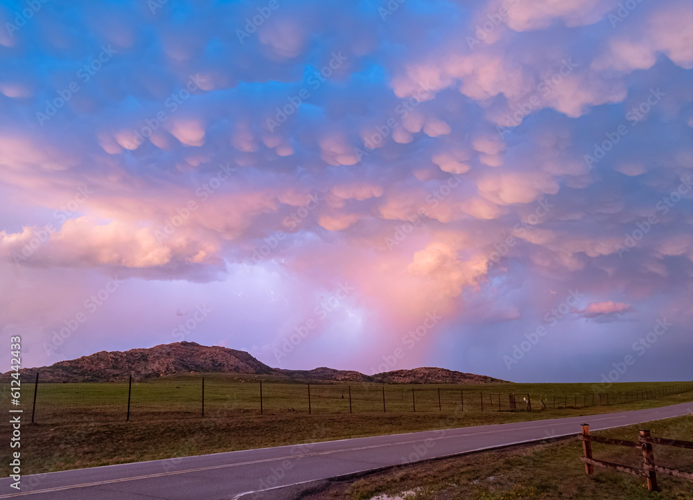 Sunset view of beautiful clouds and lighting in Wichita Mountains National Wildlife Refuge