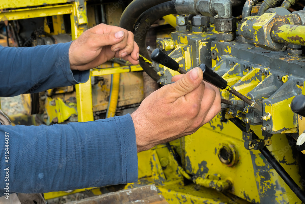 The work of the operator on the control levers of industrial equipment The work of the operator on the control levers of industrial equipment