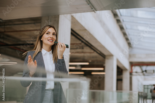 Young business woman using ...
