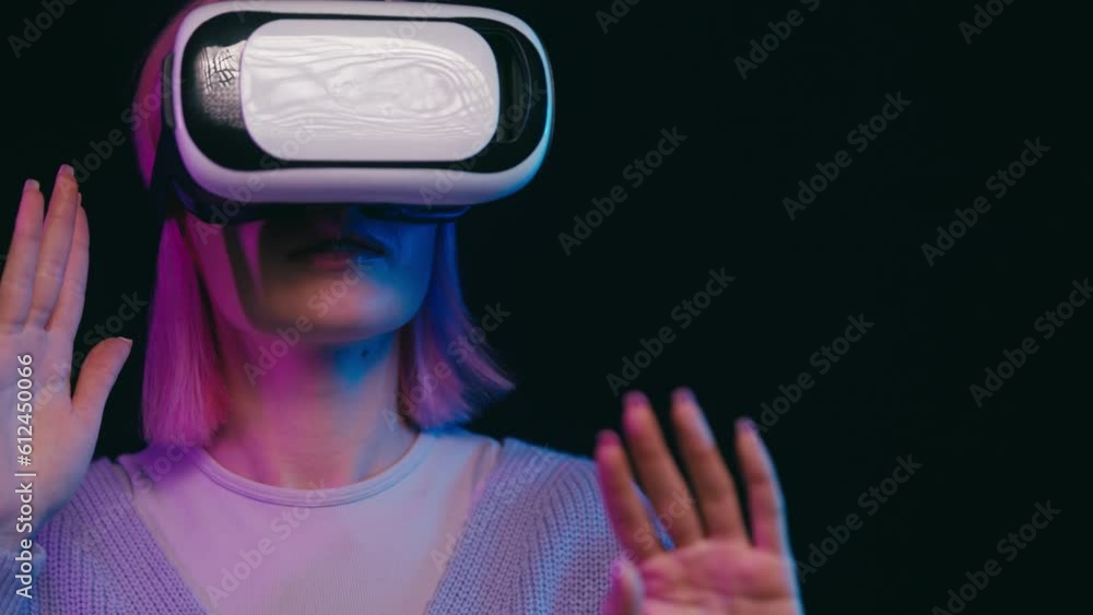 Pink-haired woman wearing vr headset, video game entertainment, cyberspace Pink-haired woman wearing vr headset, video game entertainment, cyberspace