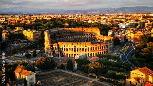 Drone view of Colosseum amphitheatre at sunset, Rome, Italy