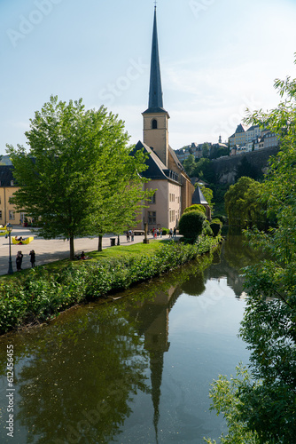 Neumünster abbey next to Alzette river with a beautiful reflection on the water