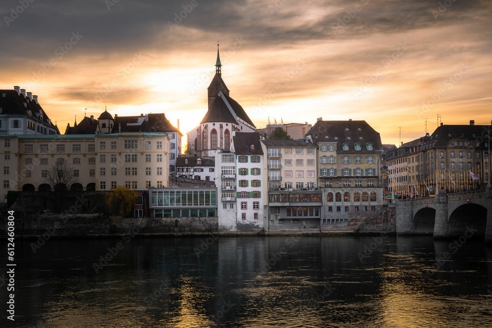 Beautiful view of the sunset on the buildings at the Miltere bridge in Basel