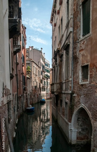 Vertical shot of a canal in Venice, Italy.