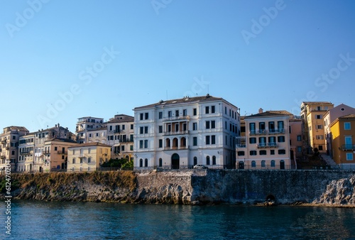 Buildings by the waterfront in corfu © Kixiik/Wirestock Creators
