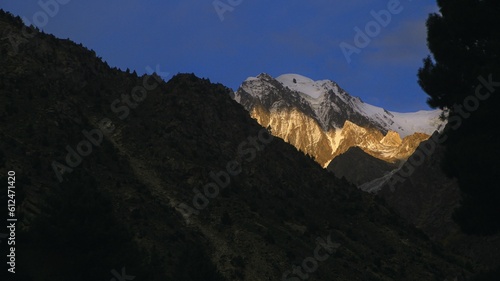 High mountain landscape covered with snow © Uzair Ansari/Wirestock Creators