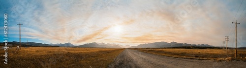 Panoramic view of a Trans-Canada highway outside of the Canadian Rockies at sunset