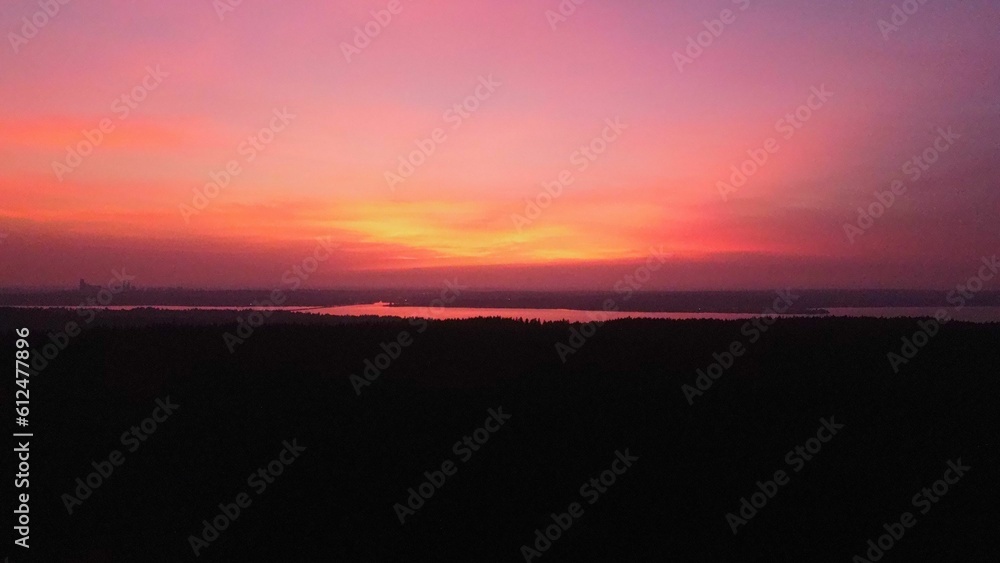 Aerial view of a pink and black sunset