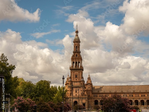 Beautiful building against a cloudy sky in the central square of Seville, Spain