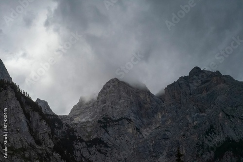 Rocky mountain on a gloomy day © Marci Koos/Wirestock Creators