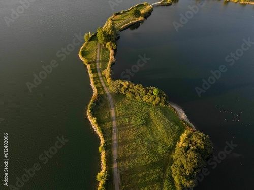 Green path over a lake in IJsselstein, Utrecht, Netherlands photo