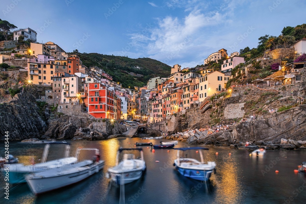 Closeup view of boats on a colorful residential buildings background, Riomaggiore