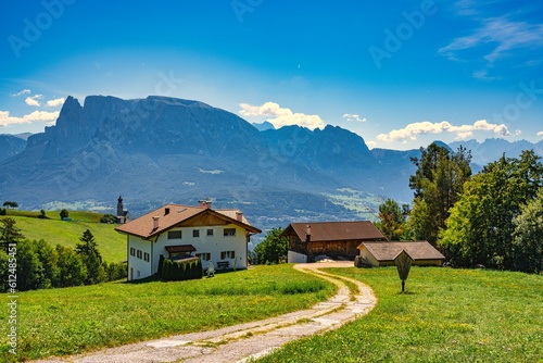 Beautiful view of pathway to the houses on a mountain background