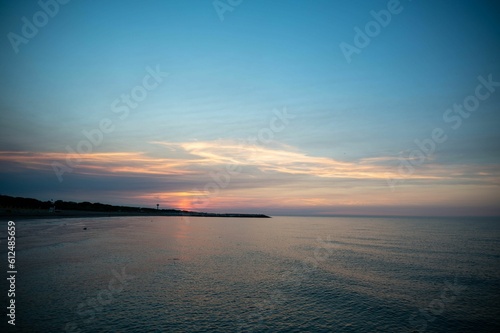 Beautiful landscape of the sea on the sunset © Peter Augsten/Wirestock Creators