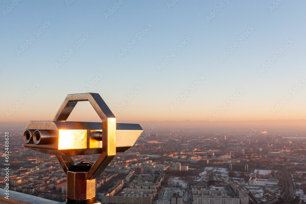 Binoculars at the observation deck at Olympiaturm in Munich, Germany Binoculars at the observation deck at Olympiaturm in Munich, Germany