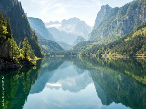 Scenic view of the Front Gosau Lake near the town of Gosau, Austria surrounded by lush green forests