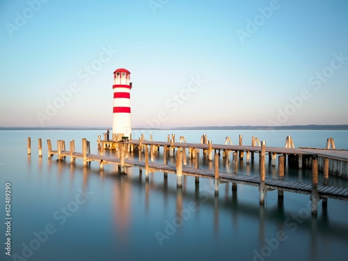 Scenic view of Podersdorf Lighthouse on blue sunset sky background in Neusiedl am See, Austria