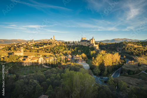 Segovia city skyline at dusk, with the cathedral and castle